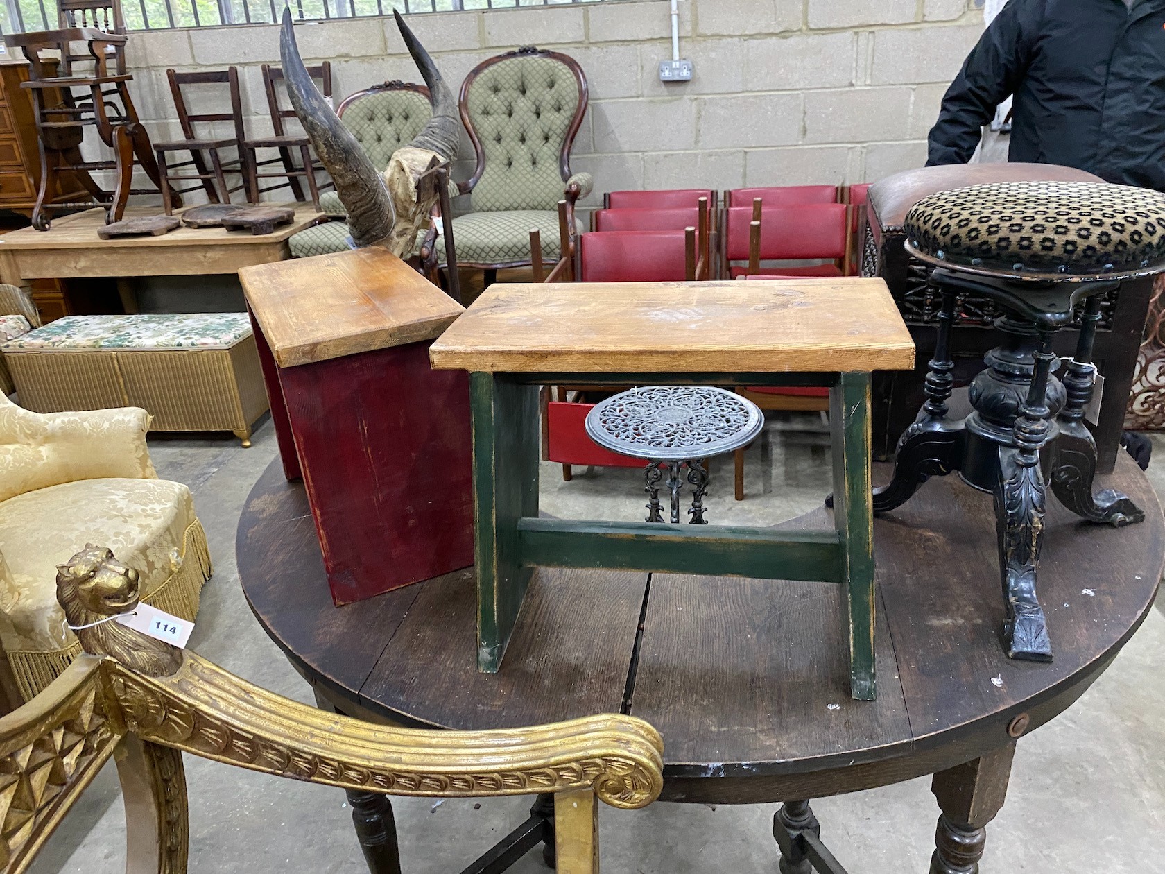 A Damascan footstool with leather seat, a Victorian adjustable piano stool and two painted pine stools